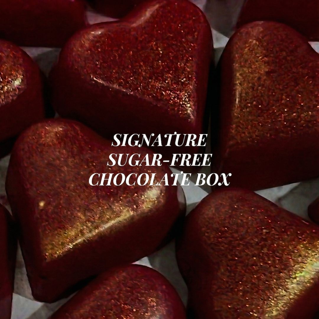 Heart-shaped chocolate pieces with a 'Signature Sugar-Free Chocolate Box' text overlay.